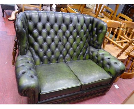 Green leather effect button back Chesterfield settee