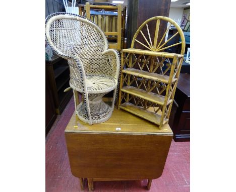 Twin flap dining table with interior cupboard, small basket weave peacock style chair and a bamboo effect four shelf hanging 