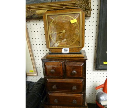 Art Deco style mantel clock by Philans of Huddersfield and a lacquered set of treen drawers