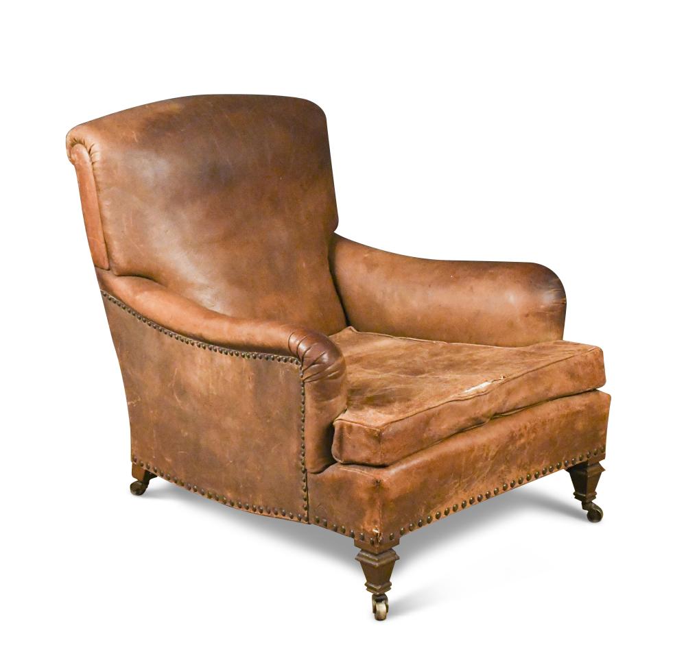 A Howard Type Leather Easy Armchair With Low Back And Long Arms