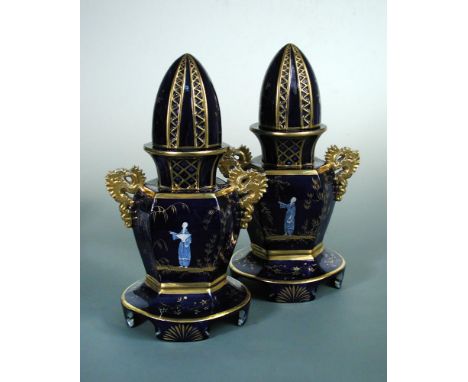 A pair of Mason's mazarin two handled vases and covers, circa 1820, of rare shape, the hexagonal body decorated with chinoise