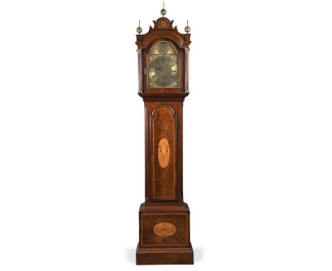 A George III mahogany longcase clock, the hood with shaped cresting and three ball finials above brass dial signed in the arc