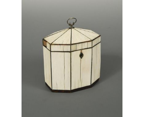 A George III tent-top ivory tea caddy, of octagonal form with reeded ivory panels, tortoiseshell stringing and white metal es