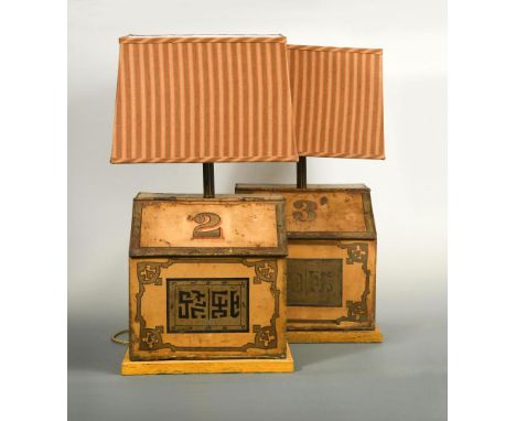 A pair of Chinese tole ware tea canisters now as lamps, each yellow ground lamp with Chinese characters to front 37 x 37cm (1