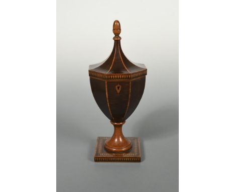 A sycamore pedestal urn-shaped tea caddy, of octagonal form with acorn finial, raised on a square base with tunbridge decorat