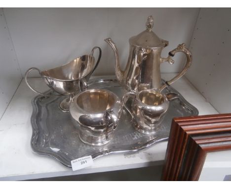 4 pc metal tea set on tray