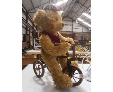 Collectable German teddy bear on tricycle