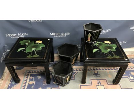 A pair of 20th Century Chinese black lacquered occasional tables, painted with water lilies on square legs to scroll feet, 50