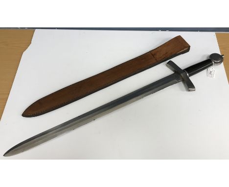 A modern replica Viking sword with ebony handle with steel pommel and hilt and blade, blade length 68 cm, over all length 89.