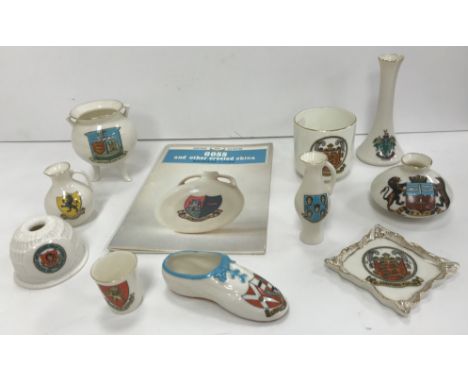 A collection of 65 WH Goss crested china items including Blandford-Forum, Weston-Super-Mare, Bath, Clevedon, Port Erin, Beaum