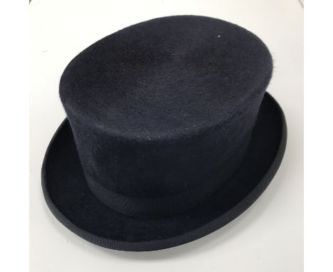 A Christy's navy fur felt dressage hat UK 6 7/8, a vintage Scott & Co silk top hat approx 54 cm circumference and a vintage C