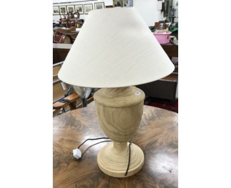 A Neptune turned wooden table lamp of baluster form, 53 cm high including fittings, a further Neptune table lamp of stacking 