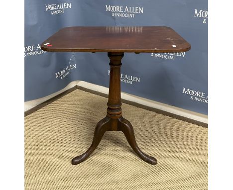 A 19th Century mahogany tea table, the rounded rectangular snap top (now fixed) on a turned tapering pedestal to tripod base,