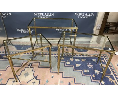 A nest of three vintage / retro brass framed glass topped tables, the biggest 35.5cm depth x 59.5cm wide x 46cm high and a si