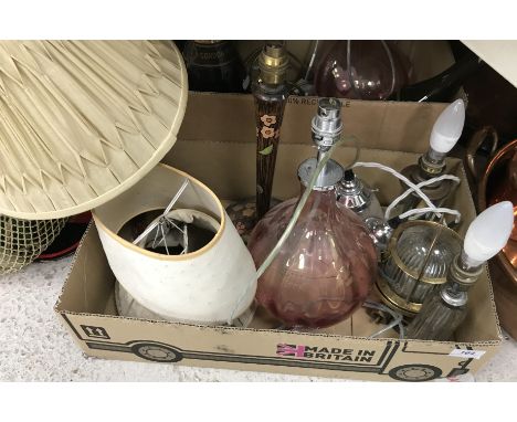 Two boxes of assorted lighting to include modern pink glass table lamps and various lamps made of vintage champagne and wine 