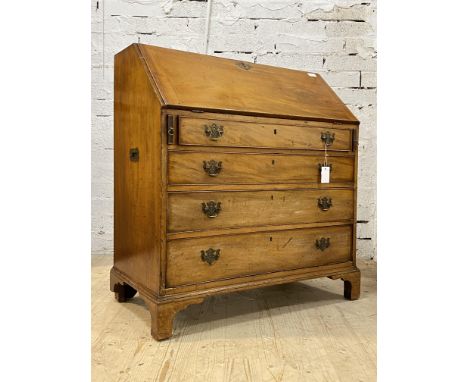 A Georgian mahogany bureau, fourth quarter of the 18th century the  cross banded fall front opening to a well fitted interior