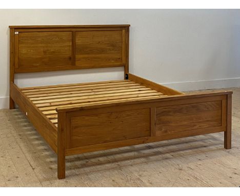 A contemporary oak panel end king size bed frame, complete with slatted base H100cm, W150cm, L210cm,