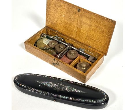 A 19thc black paper mache Abalone shell inlaid oval spectacle case with blue velvet lined interior, (H x 2cm x L x 16) and a 
