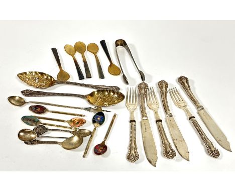 A collection of flatware including a set of five horn egg spoons, pair of Epns chased berry spoons, four pairs of Epns fish k