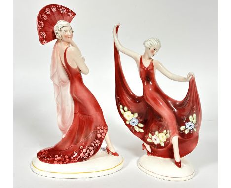 Katzhutte, two Art Deco porcelain figures, one with draped shawl holding a fan behind her head and the other with both arms r