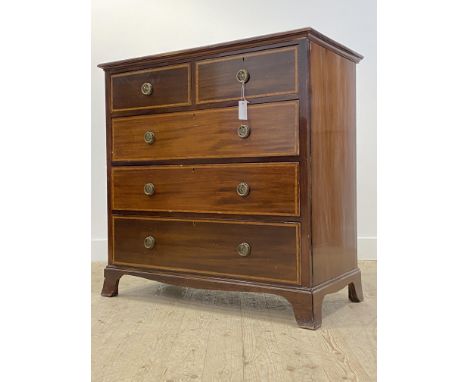 A 19th century mahogany chest, fitted with two short and three long graduated and satinwood inlaid drawers, raised on splayed