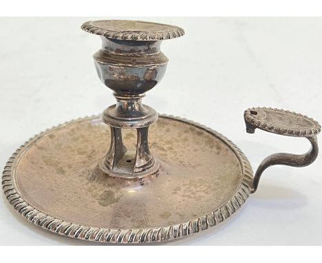 A Smith Tate &amp; Co Sheffield hallmarked Georgian silver chamber stick with gadrooned rim (1818) and an associated Sheffiel