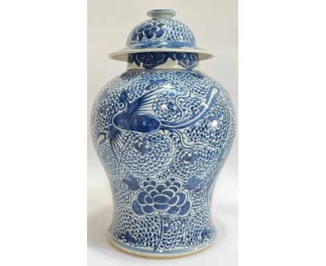 A large Chinese blue and white Kangxi Revival/style porcelain lidded baluster vase/jar decorated with phoenixes and flowers a