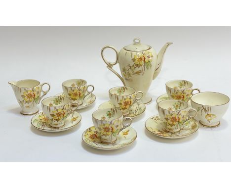 A Royal Staffordshire Delphine pattern part tea service comprising six tea cups, six saucers, a sugar bowl (h-6cm), a milk ju