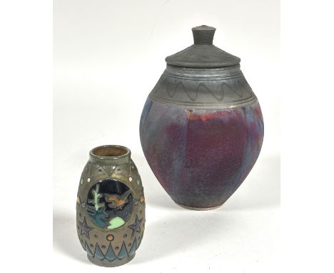A modern Art Pottery ovoid vase with domed cover with drip scroll design and similar border,  with textured blush style glaze