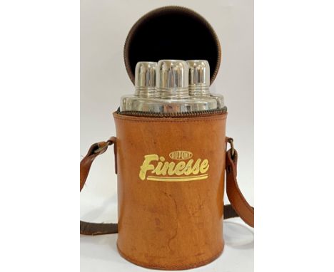 A Du Pont Finesse travelling triple flask with leather carry case containing three glass flasks with chrome plated screw tops