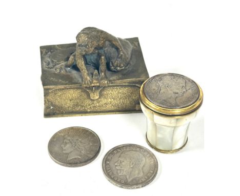 A Eastern miniature cast brass box with seated ape on top and sack, cover loose, (H x 7.5cm L x 8cm), American silver $1 Doll