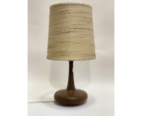 A mid century turned teak lamp, of compressed ovoid form, the base stamped Modonell 1980, complete with original shade H62cm