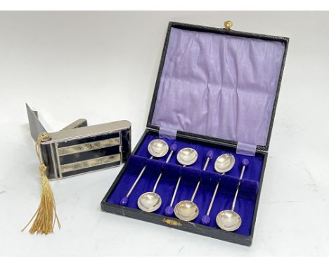 A boxed set of silver plated coffee spoons with purple coffee bean terminals (box l- 14cm, w- 15cm), together with an Art Dec