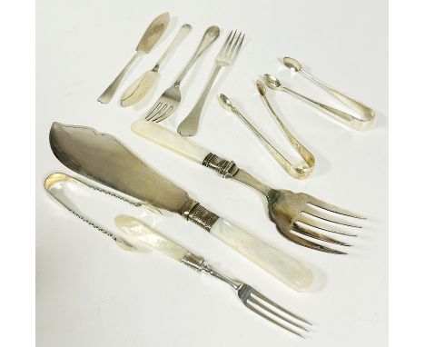 An Edwardian pair of mother of pearl handed Epns fish servers, three various pairs of silver sugar tongs, a pair of Sheffield