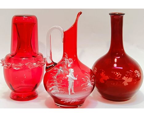 A group of Victorian cranberry/ruby glass comprising a globular bottle with engraved fruit and vine pattern (pontil mark) (h-