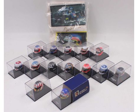 14 various boxed Minichamps 1/8 scale Formula 1 helmets from 1996 and 1997 to include drivers such as Damon Hill, Jean Alesi 