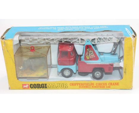 A Corgi Toys No. 1144 Chipperfield Circus crane truck Scammell Handyman Cab comprising of red and light blue body , with rhin