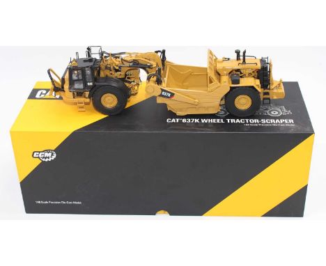 CCM Classic Construction Models 1/48th scale diecast model of a CAT 637K Wheel Tractor Scraper, housed in the original card b