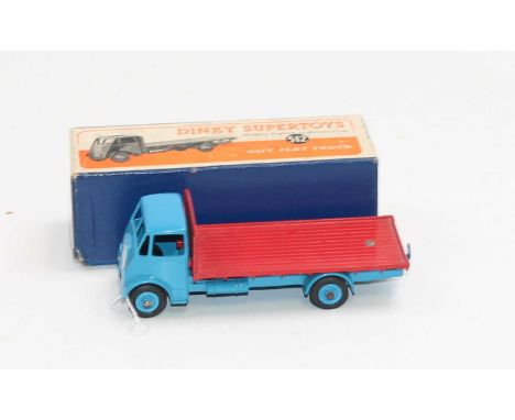 Dinky Toys No. 512 Guy flat truck comprising of light blue cab, chassis and hubs with red back, housed in the original orange