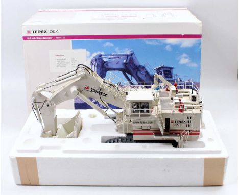 O and K Terex 1/50th scale model of a Hydraulic Mining Shovel, finished in white, model requires a good clean and some handra