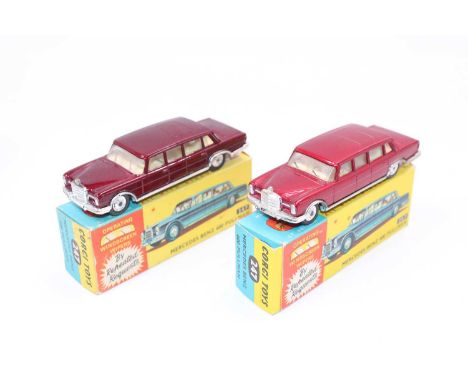 2 Corgi Toys No. 247 Mercedes Benz 600 Pullman consisting of one in lighter metallic maroon body with off-white interior and 