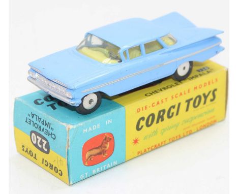 A Corgi Toys No. 220 Chevrolet Impala comprising of light blue body with yellow interior, silver side flash with spun hubs, h