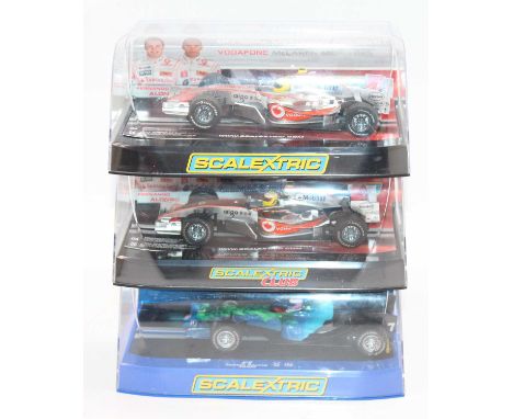 3 boxed Scalextric Formula 1 racing cars to include, C2817 Honda Jensen Button Earth Car 2007, C2880 McLaren Mercedes MP4-21 