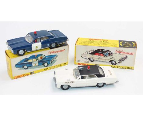 2 Dinky Toys Police cars consisting of: No. 251 USA police car, white body with black roof, off-white interior, red roof ligh