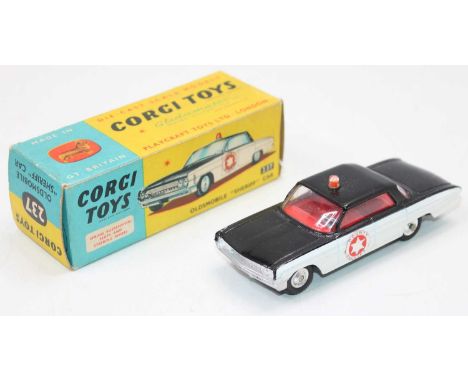 A Corgi Toys No. 237 Oldsmobile Sheriff car, comprising of black &amp; white body with red interior with County Sheriff stick