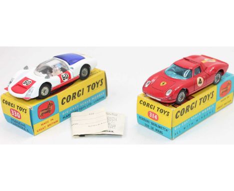 A Corgi Toys boxed racing car diecast group, two examples to include a No. 330 Porsche Carerra 6, finished in white and red w