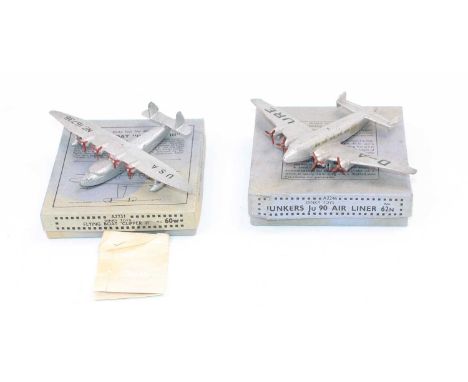 2 Dinky Toys pre-war aeroplanes consisting of, No. 60W Flying Boat "Clipper III" in silver with red propellers in good condit