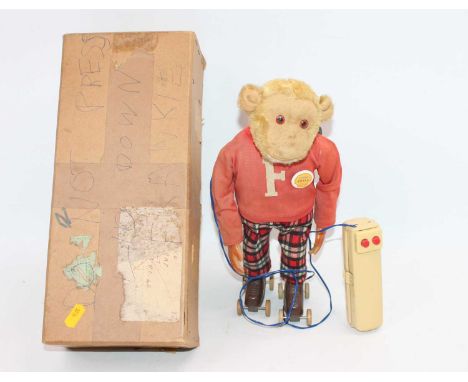 Rare 1961 Frankie the Monkey on roller skates, rare example with control unit in cream (GVG)
