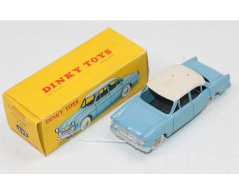 French Dinky Toys, No.24Z Simca Versailles, light blue body with white roof, convex chrome hubs, in the original yellow pictu