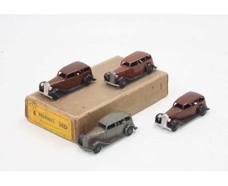 Dinky Toys No.30d original Vauxhall Trade box, containing 4 examples, 3 brown and 1 grey, two in superb condition, some with 